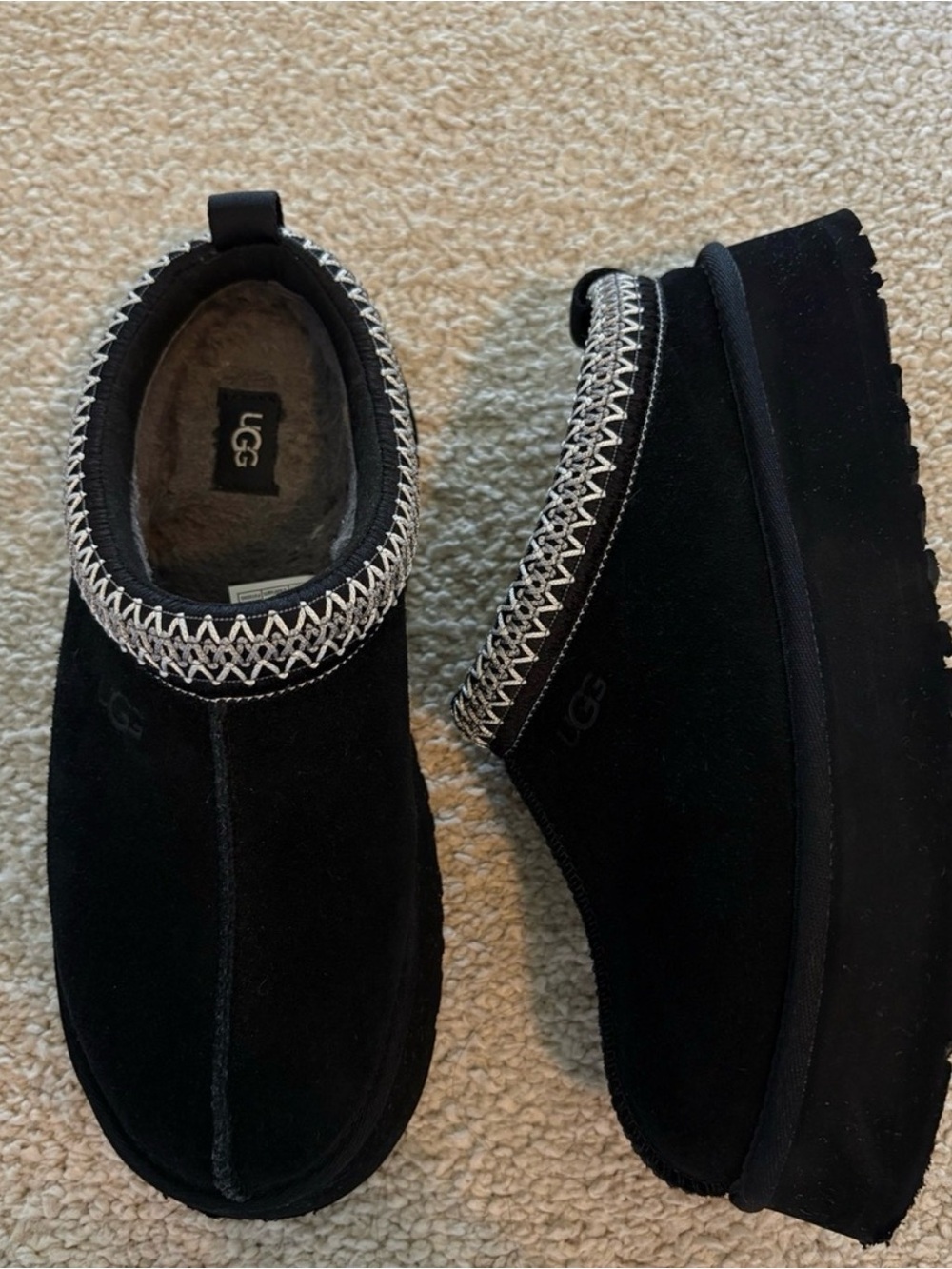 UGG black platform tazz slip ons
